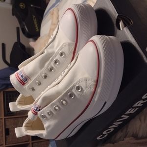 Converse All Star women's shoes. Only worn a few minutes. Missing shoe strings.